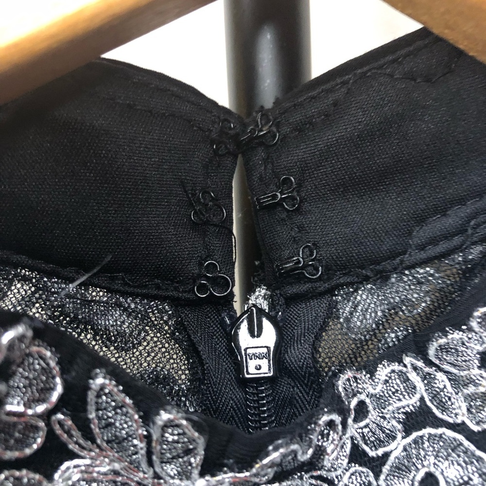 Long black and silver gown.👗